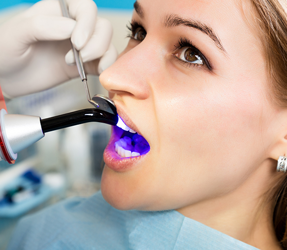 Patient receiving cosmetic dental bonding