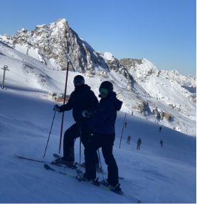 Two people skiiing