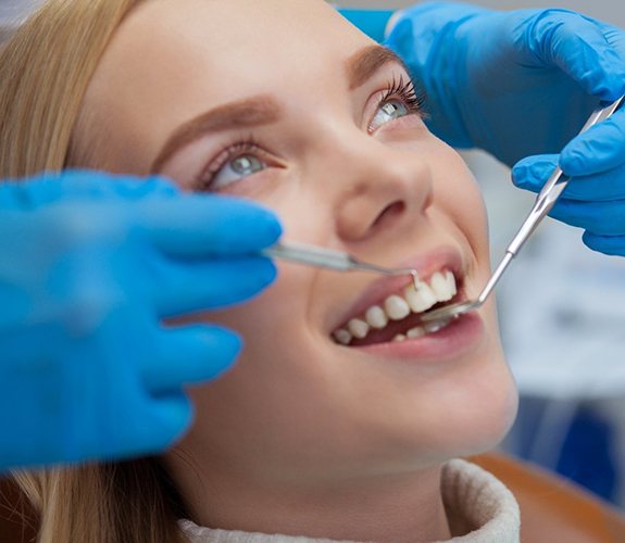 Patient visiting emergency dentist in Wilmington