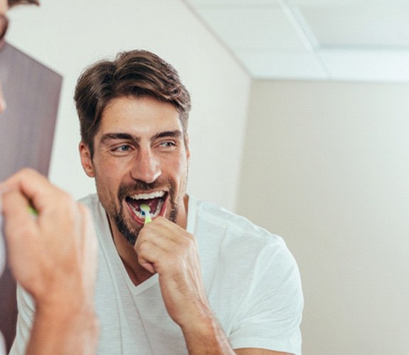 Man brushing teeth