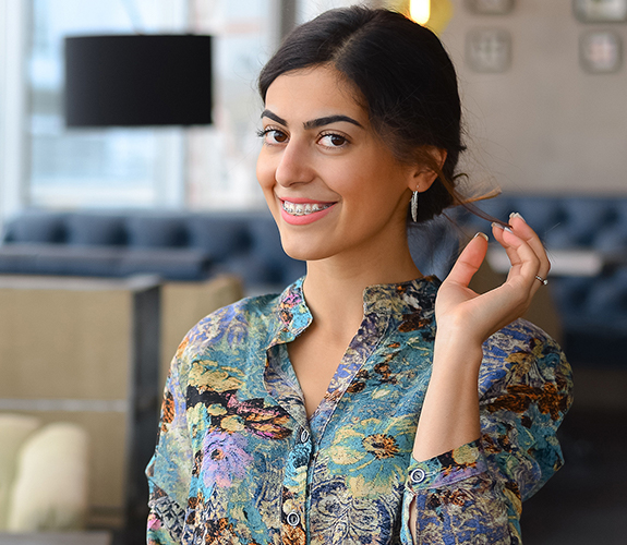 Smiling woman with adult orthodontics