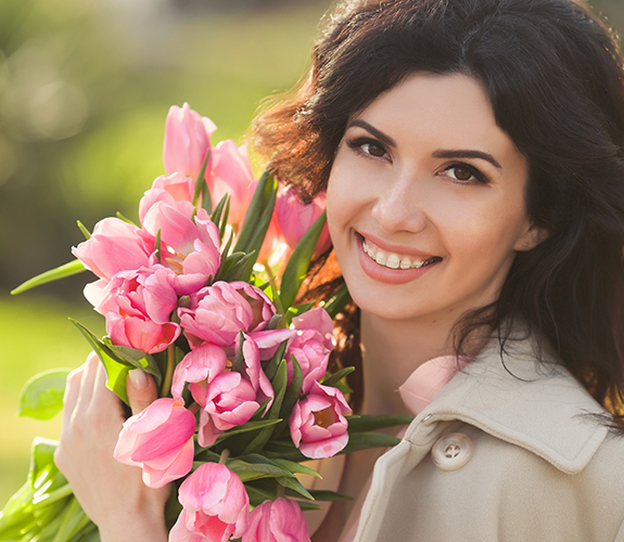 Woman with tooth colored orthodontics