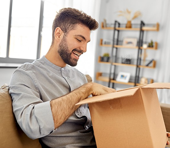 Man opening a package