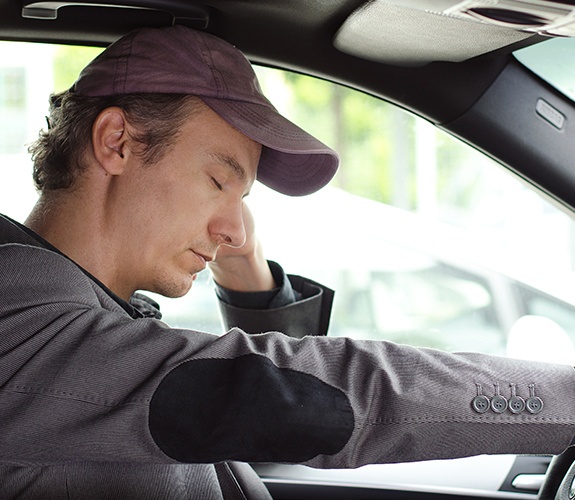 Man in need of sleep apnea therapy falling asleep while driving