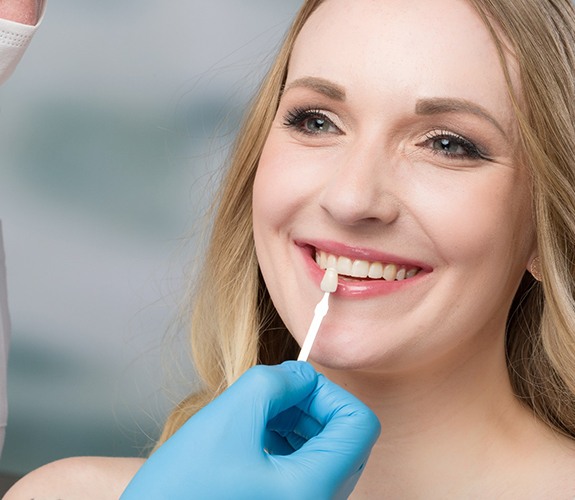 Woman with veneers in Wilmington