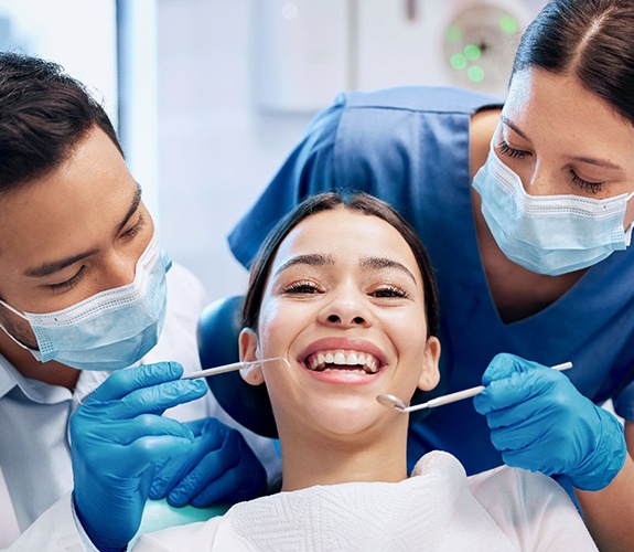 Girl visiting the dentist for a professional cleaning