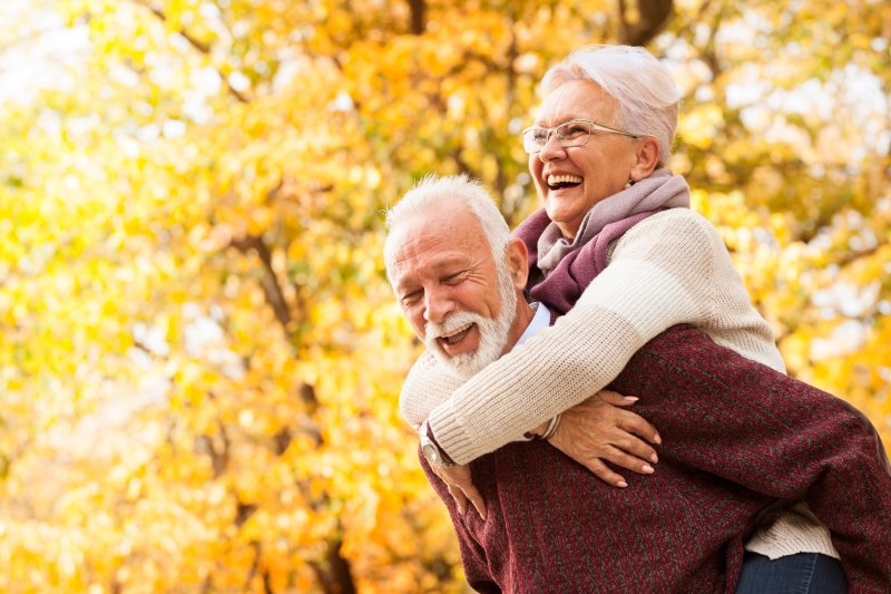 couple with dental implants